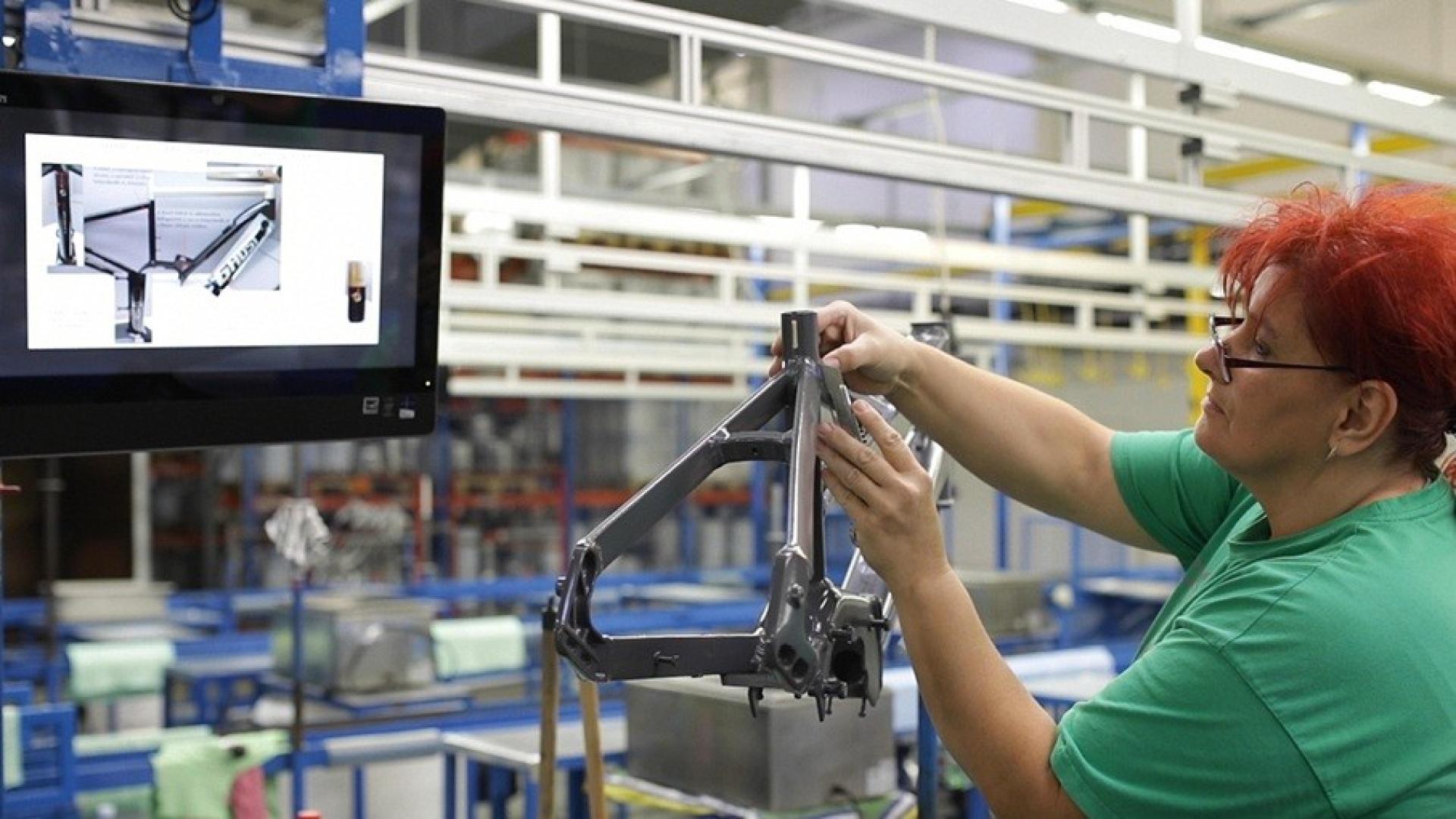 Woman in bike factory