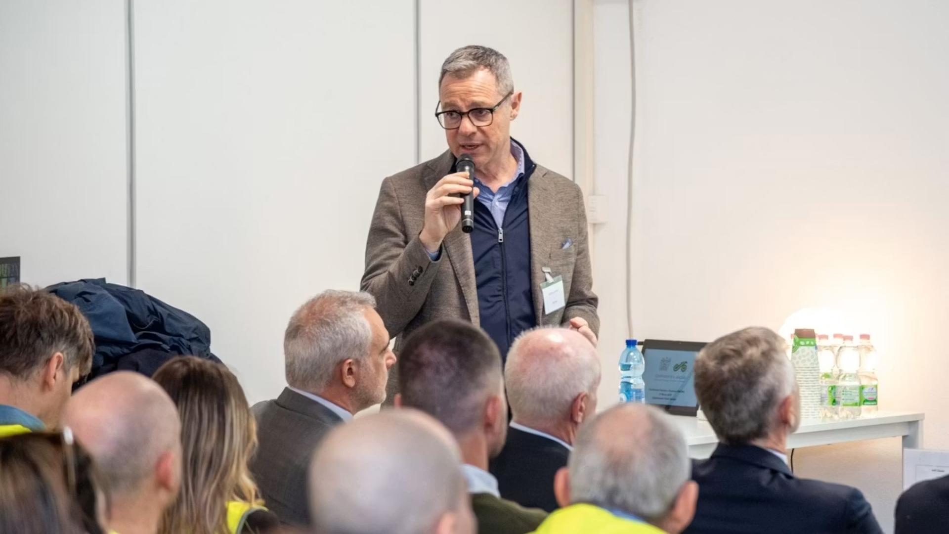 Man speaking to the audience